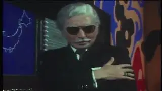 Rainbowman chops off Mr.  K's hand