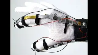 DextrES: Wearable Haptic Feedback for Grasping in VR via a Thin Form-Factor Electrostatic Brake