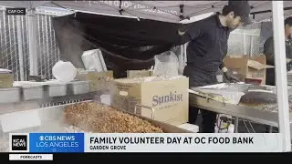 Volunteers put together thousands of meals at the OC Food Bank