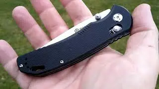 Ganzo G7531 Knife  440C blade steel.  Black G10 handles.