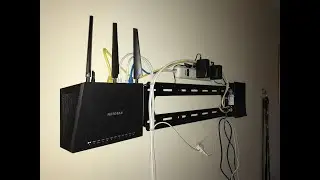 Hiding A Router, cable modem, surge protector , and wires behind TV.