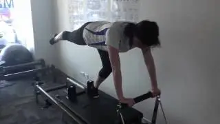 Clinical Pilates Perth - Standing Knee Stretch Single - i Pilates Perth
