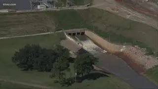 AIR 11 shows water being released from Barker and Addicks Reservoirs