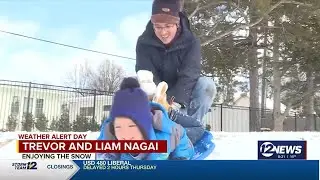 Students in Wichita enjoy snow day sledding in College Hill