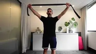 Shoulder mobility using a strap