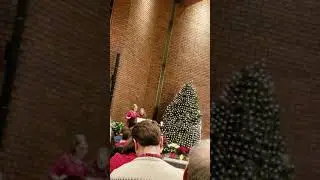Me and my friend Cantoring at christmas eve mass