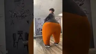 Guy Break Dancing In Inflatable Fat Suit