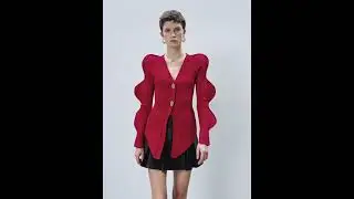 A sculptural silhouette in bold red.