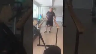 Nils Grimley walking with just hand rail.