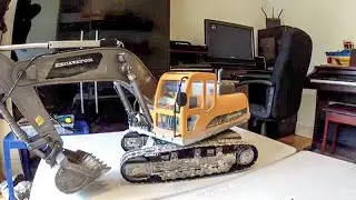 RC excavator with linear servos