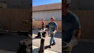Heating and bending the metal support for a pelican sculpture