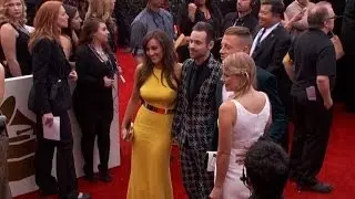 Music stars rock the Grammys red carpet