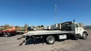 1999 INTERNATIONAL 4700 ROLLBACK TRUCK