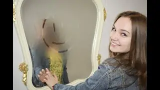funny girl in wet jeans and a wet denim jacket in the room