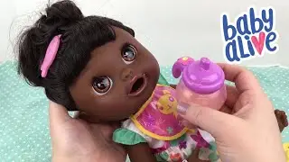 Baby Alive Real Surprises Violet Drinks Orange Doll Juice