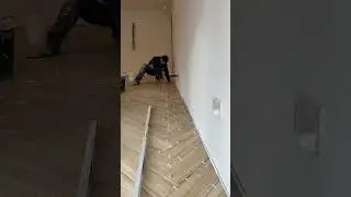 Herringbone floor wood effect tiles