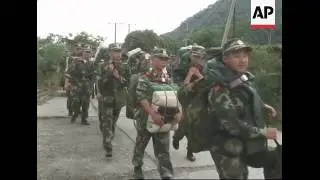 Soldiers guarding road to quake epicentre Wenchuan