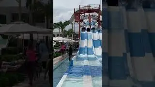 Blue and white mat racers water slides at the grand at moon palace in Cancun Mexico