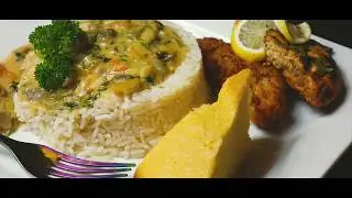 THE BEST Cornbread Fried Chicken, with Homemade gravy and rice.