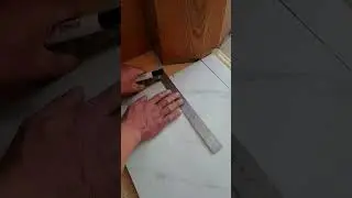 Measurement process for cutting floor tiles in the corner of the apartment