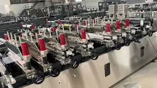 Computer Controlled 3 Side Sealing with Plastic Snacks Bag Zipper Pouch Making Machine