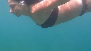 Crystal-clear underwater video: Toronto's cleanest beach, pebble beach, no sand.