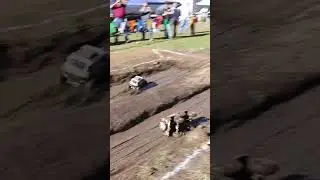 RC mud bog racing with crawler trucks