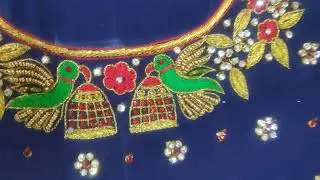 Parrot design with zari loading and Zarkans with flowers