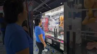 Claw Machine Game at Round 1 Arcade- Box Push to Win