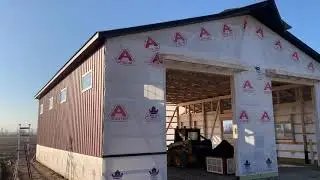 40x48 14&rsquo; pole barn with a widow&rsquo;s peak, textured sidewall metal, green posts, 4 foot cupola...