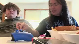 Trying food at Elmo’s grill