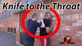 Knife to the Throat from Behind against a Wall