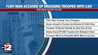 Suspect accused of dragging Michigan State Police trooper in Flint
