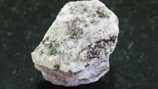 Apatite -  calcium phosphate (Ca5(PO4)3(F,Cl,OH))