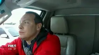 Scary! Car slides into FOX 5 Storm Chaser