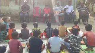 Notebooks and Pen distribution amongst kids by SKSVS Team
