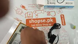 unboxing axon A155 hearing aid device by Shopse.pk In Pakistan