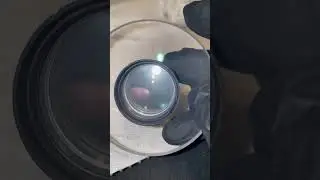 This lens needs more than some simple cleaning it appears