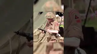 Re-enacter firing a Mk II Sten Gun