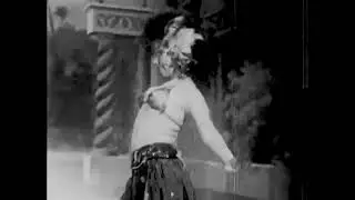 Restore mid-century burlesque performance by Rouhea Bey in Arab Dance