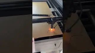 Laser cutting the Buddobot Acrylic Badge