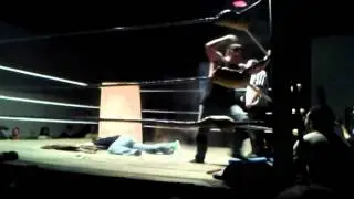 Tyler Cross blasts Marcus Mann w/steel chair!!
