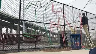 The Man Behind Jersey City's Fence Art Mystery