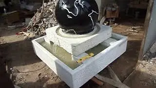 black granite stone ball fountain