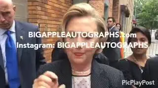 Hillary Clinton signing autographs for BIGAPPLEAUTOGRAPHS IN NEW YORK CITY