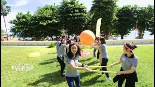Rolling ball challenge outdoor team building activity for corporate events in Thailand