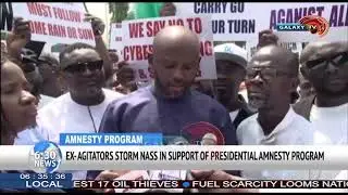 EX AGITATORS STORM NASS IN SUPPORT OF PRESIDENTIAL AMNESTY PROGRAM