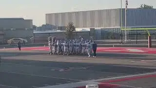 Bray.varsity.huddle.pregame.nixa