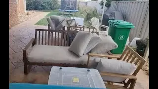 An unfinished outdoor furniture clean