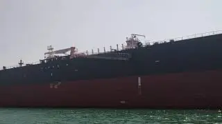 Big ship in reliance port to discharge crude oil.